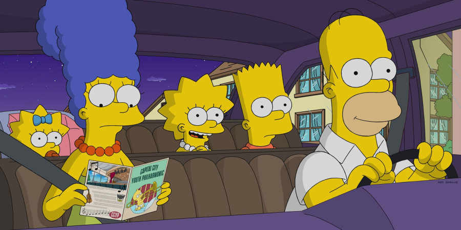 Homer et Marge Simpson avec leurs trois enfants, en route pour le récital du Youth Philarmonic.