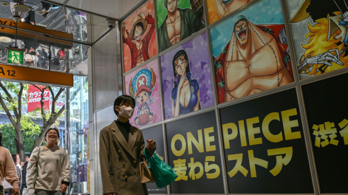 Le mur d’un hall d’entrée décoré des personnages de « One Piece », un des mangas à exporter avec le « Cool Japan ».