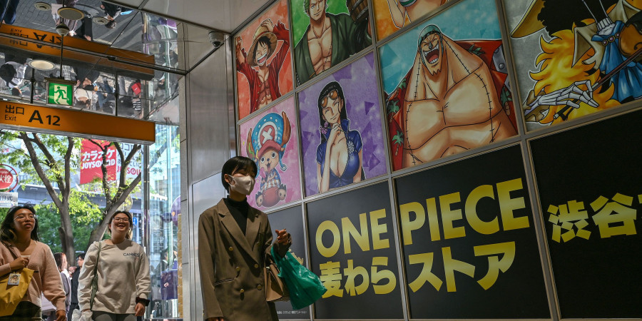 Le mur d’un hall d’entrée décoré des personnages de « One Piece », un des mangas à exporter avec le « Cool Japan ».